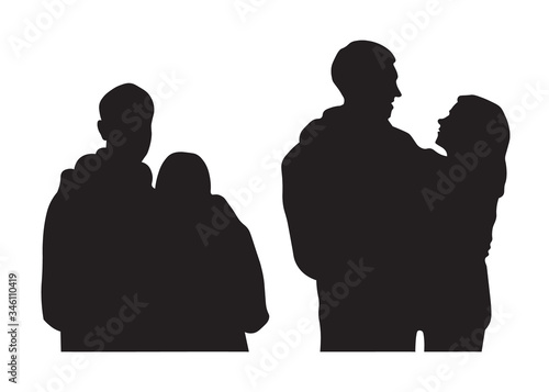 Silhouettes of a crowd, group of people, family, boyfriend and girlfriend, tourists, couple on vacation. Vector black silhouette isolated on the white background. The couple embrace each other. Hugs.