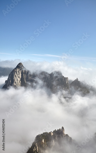 Huashan National Park mountain landscape in cloud cover, China.