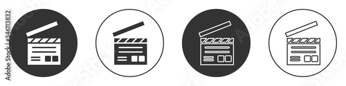 Black Movie clapper icon isolated on white background. Film clapper board. Clapperboard sign. Cinema production or media industry. Circle button. Vector Illustration