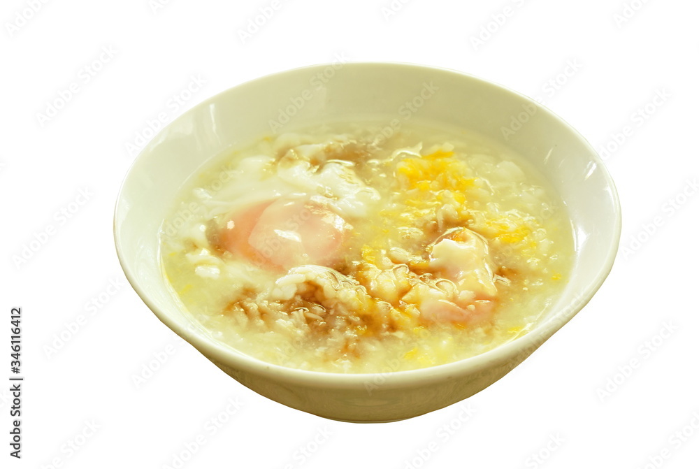 rice porridge with egg yolk dressing sot sauce on bowl