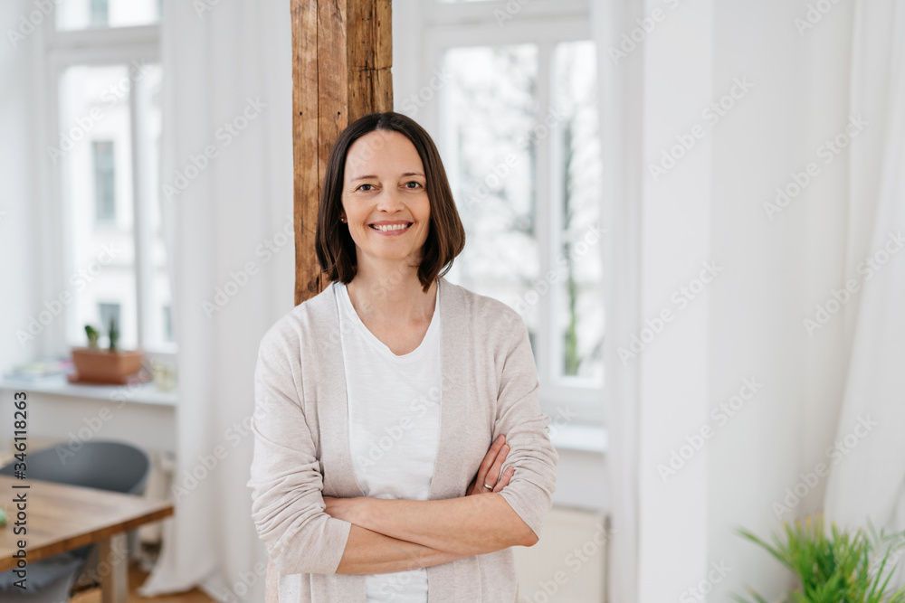 Attractive confident middle-age woman or housewife Attractive confident middle-age woman or housewife