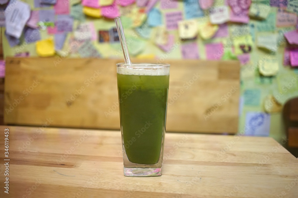 Pandan juice in a glass at a shop Pandan juice in a glass at a shop