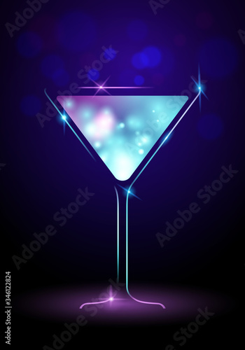 shining liquid in martini glass isolated on purple blue background