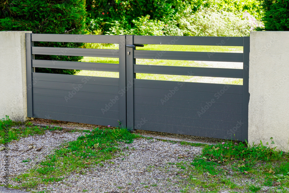 Aluminum home green brown gate portal of suburb house Aluminum home green brown gate portal of suburb house