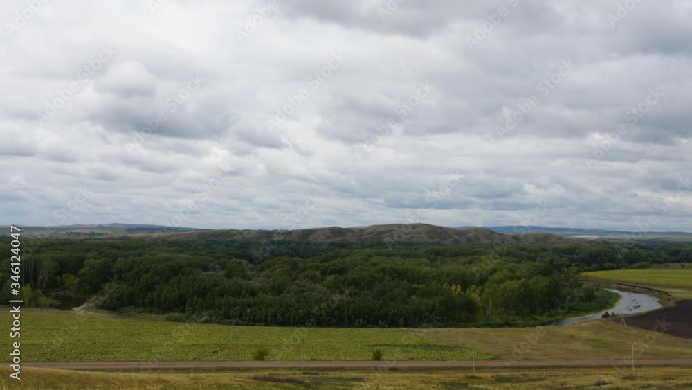 clouds move quickly across the sky. Steppes. Mountains. clouds move quickly across the sky. Steppes. Mountains.