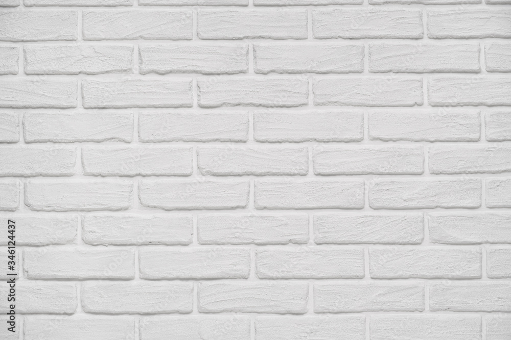 A white indoor brick wall abstract background or texture, new and clean, studio shoot A white indoor brick wall abstract background or texture, new and clean, studio shoot