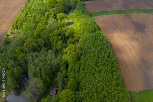 aerial view of field after sowing corn in spring