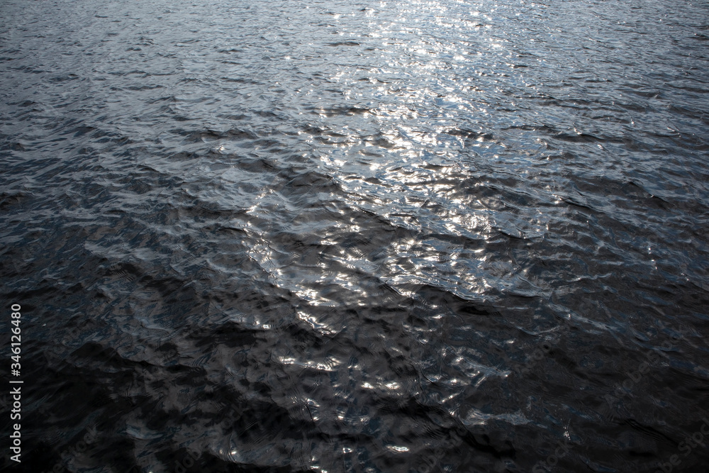 sun sparkling on water surface, Lappeenranta Finland sun sparkling on water surface, Lappeenranta Finland