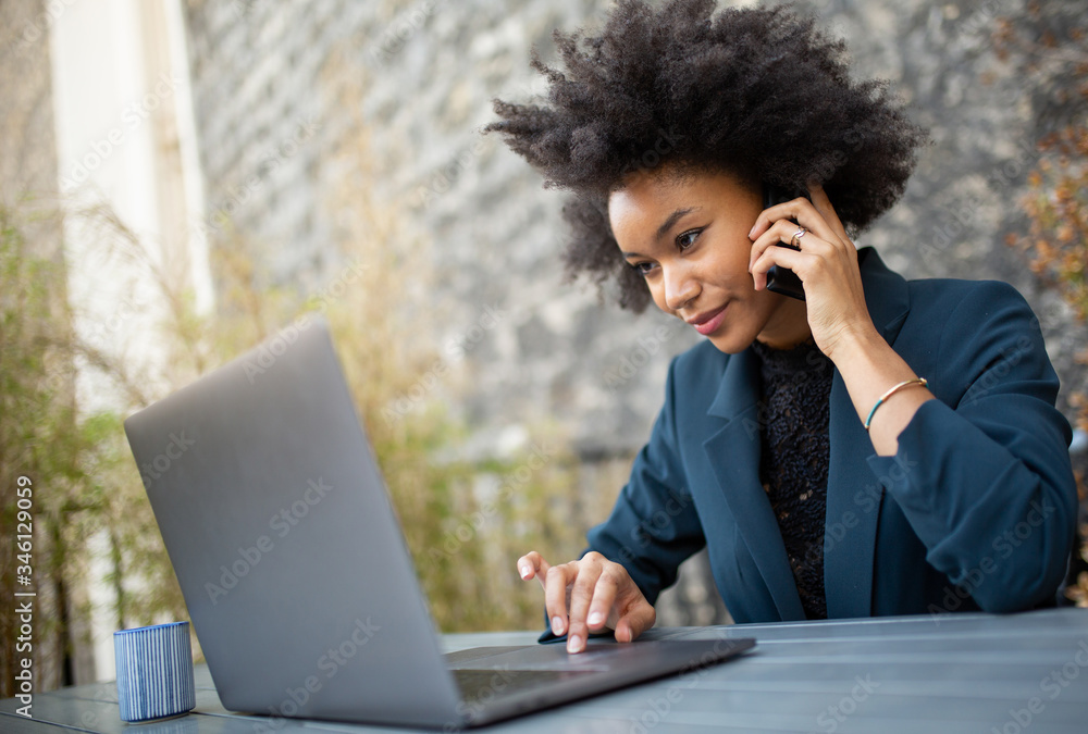Close up business woman working with laptop computer and cellphone Close up business woman working with laptop computer and cellphone