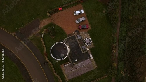 Aerial footage of cliffs and lighthouse at Hunstanton, Norfolk, UK on a foggy winter's day. photo