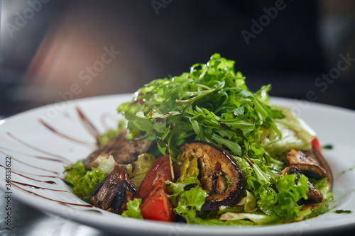 Warm salad with grilled meat and vegetables.