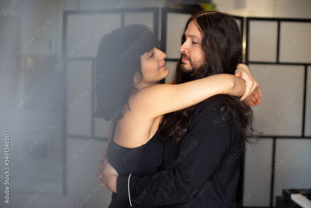 long hair couple love at home in pijama