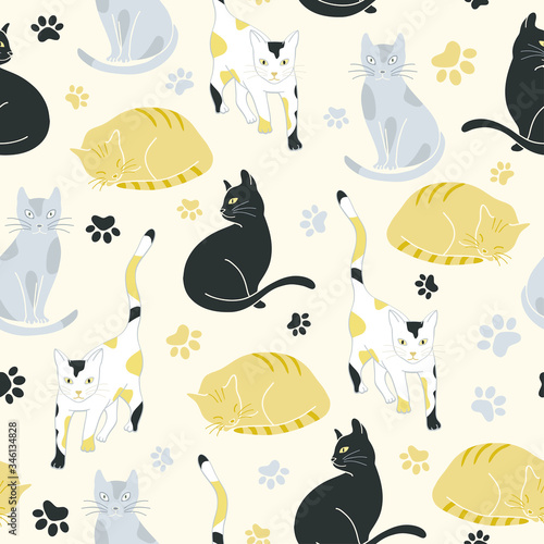 Seamless vector pattern with cats and paw prints