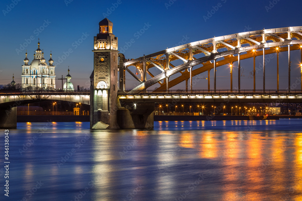 Fototapeta premium Bolsheokhtinsky bridge over the Neva river in Saint Petersburg at night