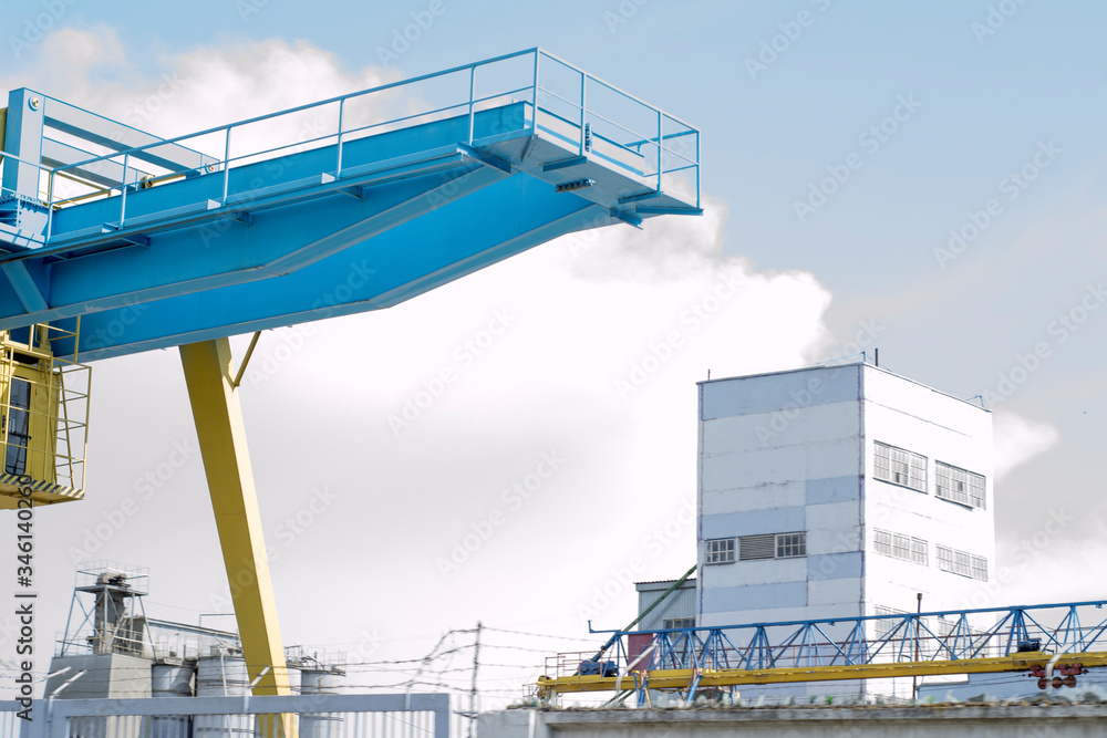 Gantry crane at shipyard on the background of blue sky Gantry crane at shipyard on the background of blue sky