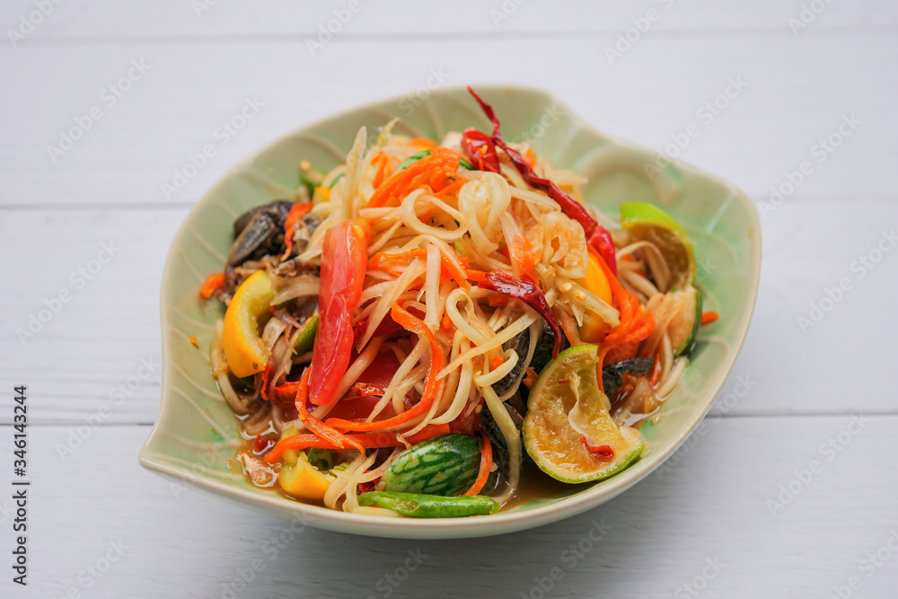 Thai food (Som Tum), spicy green papaya salad Thai food (Som Tum), spicy green papaya salad