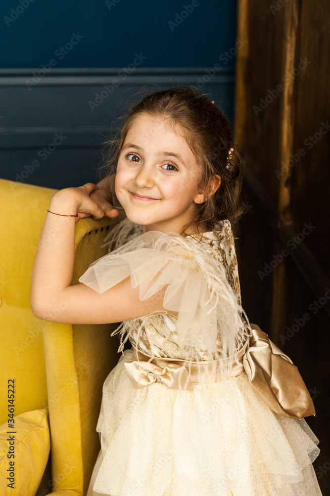 Little girl child in a fashionable dress