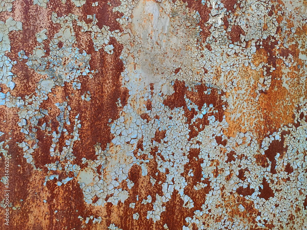 Rusty metal panel with cracked paint, corroded grunge metal background Rusty metal panel with cracked paint, corroded grunge metal background