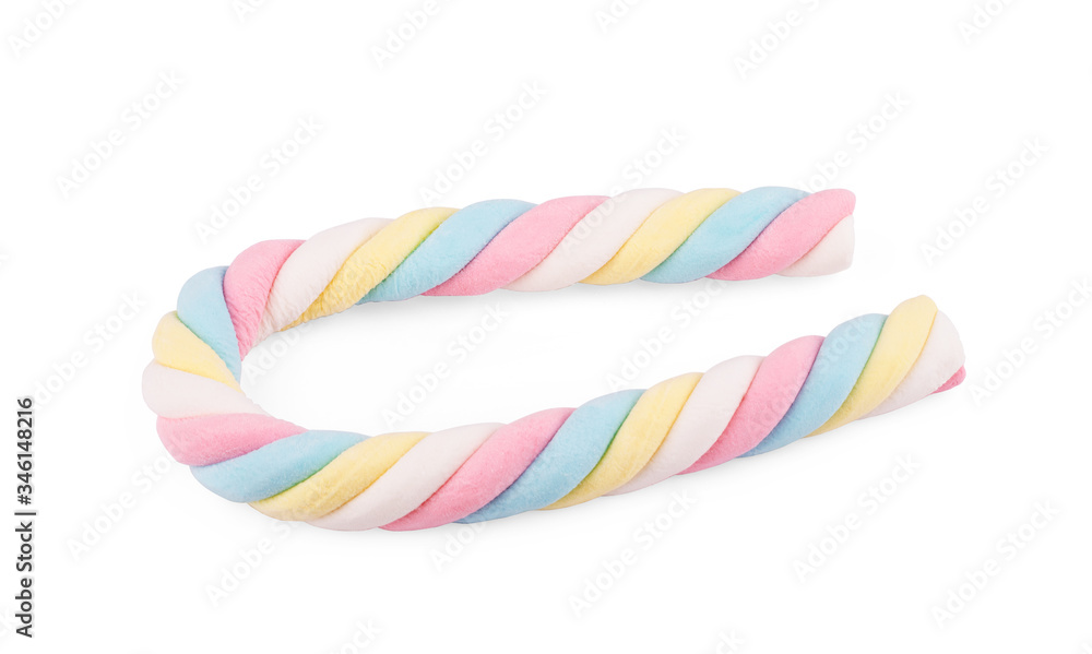 Multi-colored marshmallows lie on a white background Multi-colored marshmallows lie on a white background