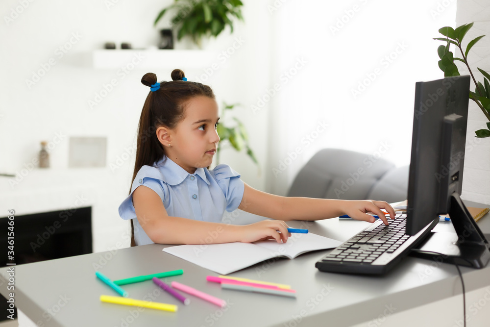 Little Girl Using Computer Concept, distance online learning Little Girl Using Computer Concept, distance online learning