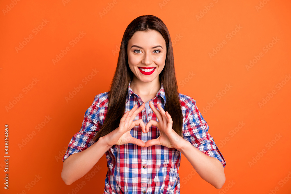 Portrait of positive cheerful girl enjoy 14-february date show love sign heart finger to her boyfriend wear good look clothes isolated over vivid color background Portrait of positive cheerful girl enjoy 14-february date show love sign heart finger to her boyfriend wear good look clothes isolated over vivid color background