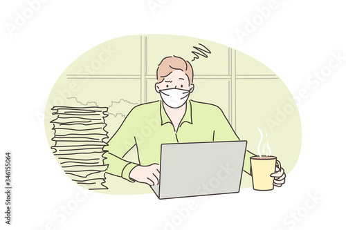 Freelance, quarantine, fatigue, coronavirus, business concept. Young overloaded businessman boy freelancer with medical face mask works remotely at home. Mental stress overworking at 2019ncov lockdown