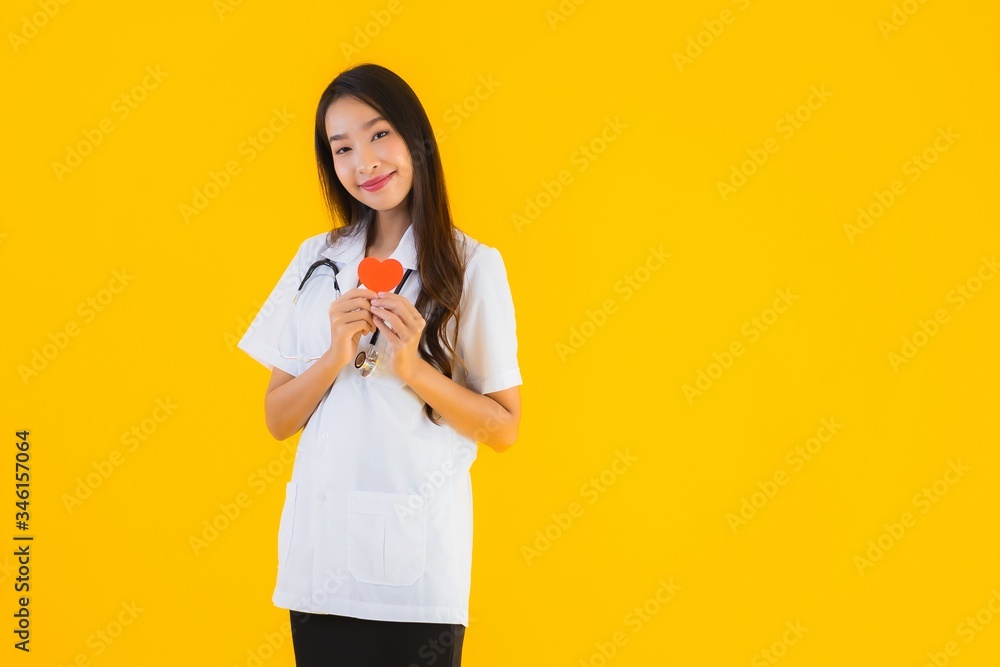Portrait beautiful young asian doctor woman show heart for symbol of love Portrait beautiful young asian doctor woman show heart for symbol of love