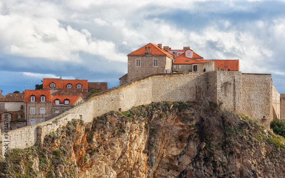 View of the old town and fortification wall in Dubrovnik, Croatia, on a sunny day