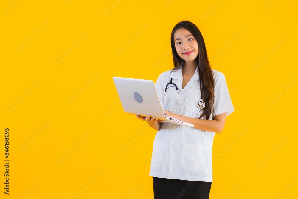 Portrait beautiful young asian doctor woman use notebook or laptop Portrait beautiful young asian doctor woman use notebook or laptop