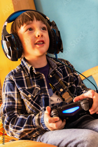boy gamer, playing with video games