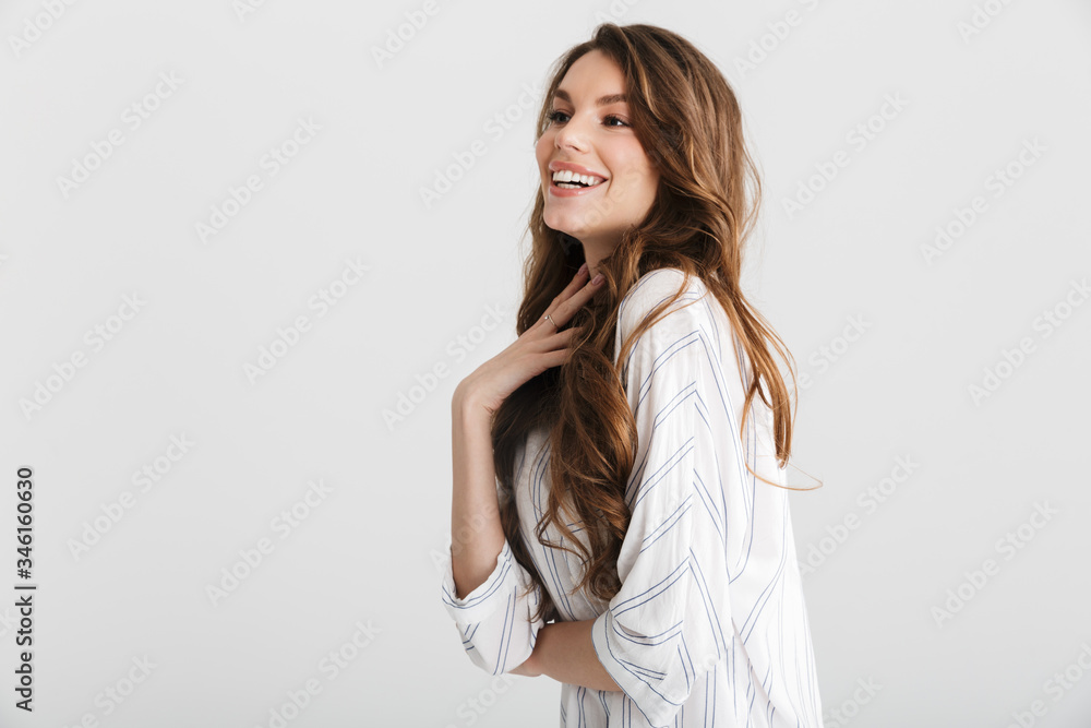 Image of joyful caucasian woman posing and laughing at camera Image of joyful caucasian woman posing and laughing at camera
