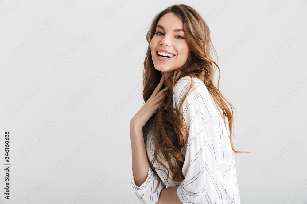 Image of joyful caucasian woman posing and laughing at camera Image of joyful caucasian woman posing and laughing at camera
