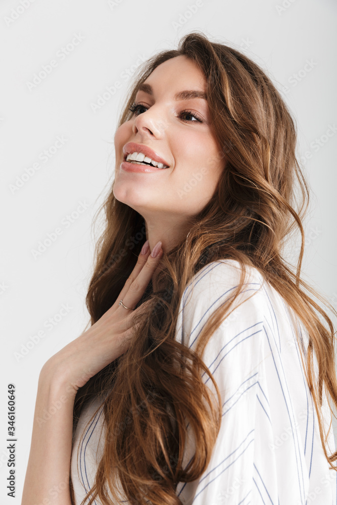 Image of joyful caucasian woman posing and laughing at camera Image of joyful caucasian woman posing and laughing at camera