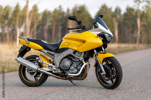 Yellow motorcycle on the road