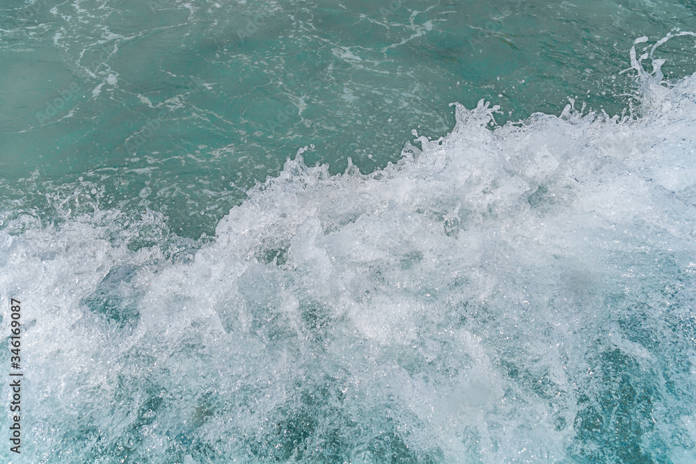 Fototapeta premium Beautiful texture splashing waves foam