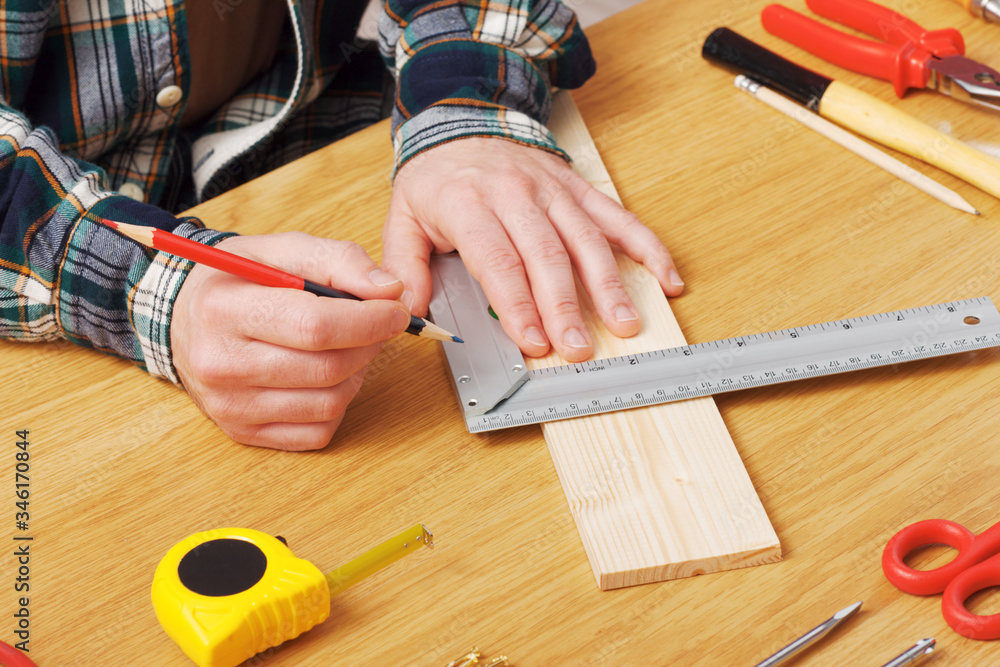 Man working on a DIY project Man working on a DIY project