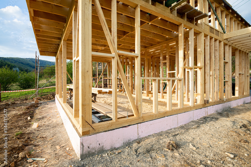 New wooden frame house under construction, outdoor residential home - obrazy, fototapety, plakaty 