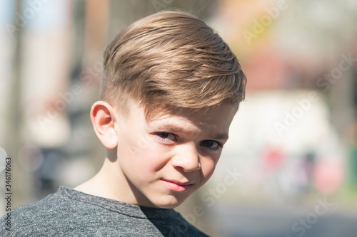 Portrait of a small boy on the street