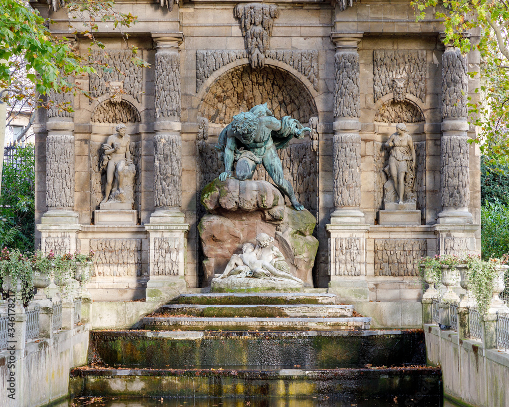 The Medici Fountain in Luxembourg Gardens, Paris, France, erected in 1861. The Left Bank, Latin Quarter landmark is popular with tourists and locals. 