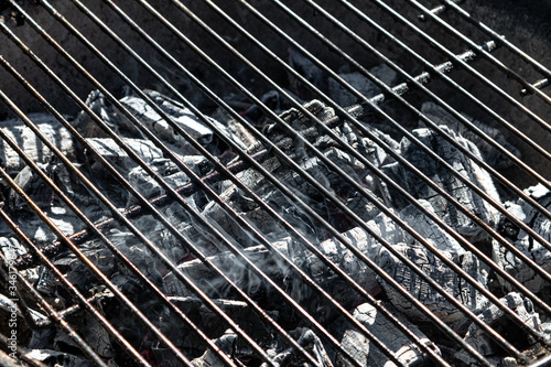 BBQ grill with burning coals close - up
