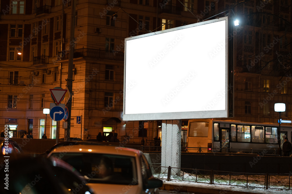 billboard in the city glows at night