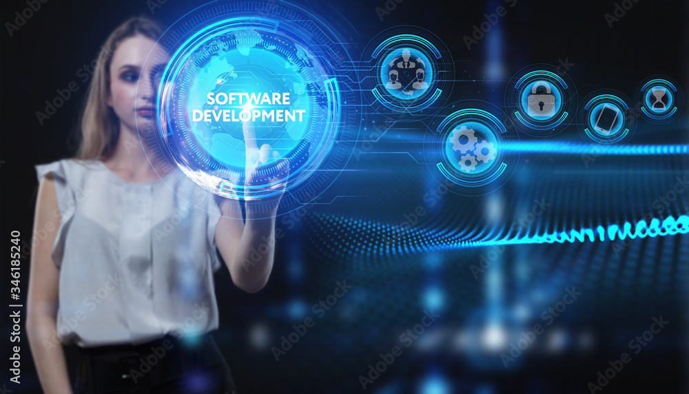 Fototapeta premium Business, Technology, Internet and network concept. Young businessman working on a virtual screen of the future and sees the inscription: Software development