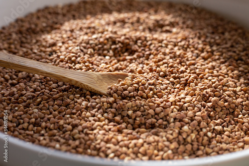 buckwheat in a wooden spoon