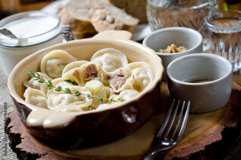 Boiled dumplings. Traditional meat dish of Russian cuisine Boiled dumplings. Traditional meat dish of Russian cuisine