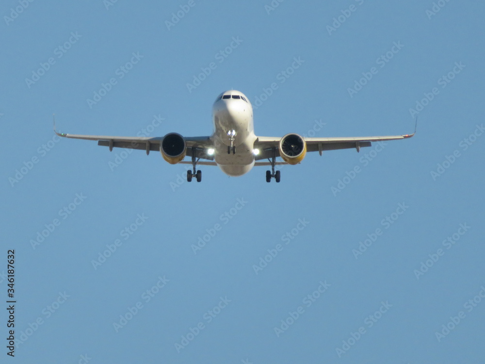 Beautiful photo of a plane landing at the airport taking land Beautiful photo of a plane landing at the airport taking land