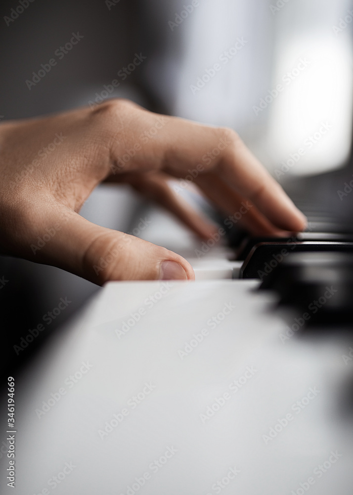 Fototapeta premium hand on the keys