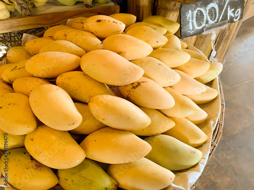 Group of sweet yellow mangos. Tropical fruit