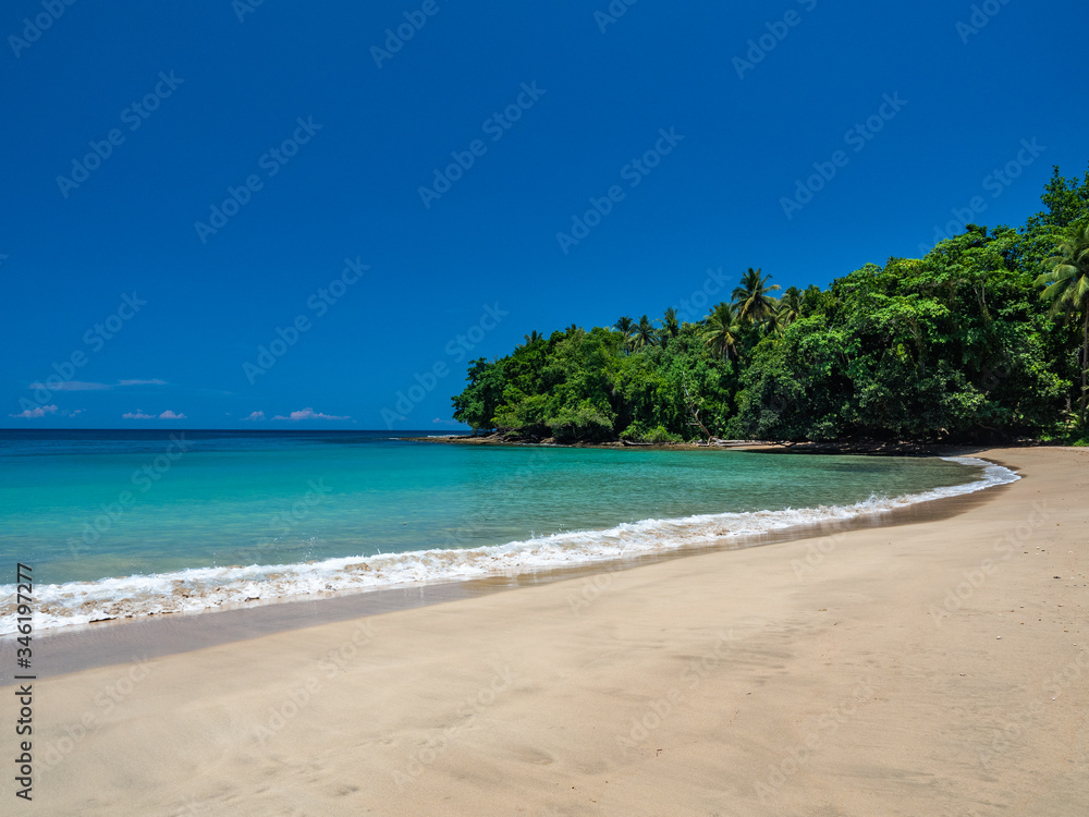 Tropical beachin Musu, next to Vanimo city, surf spot, surf beach, full of palmtrees and jungle, West Sepik, Papua New Guinea