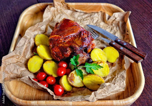 baked pork knuckle with potatoes