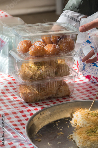 Künefe, sweet and savory levantine cheese pastry, turkish dessert specific and traditional. photo